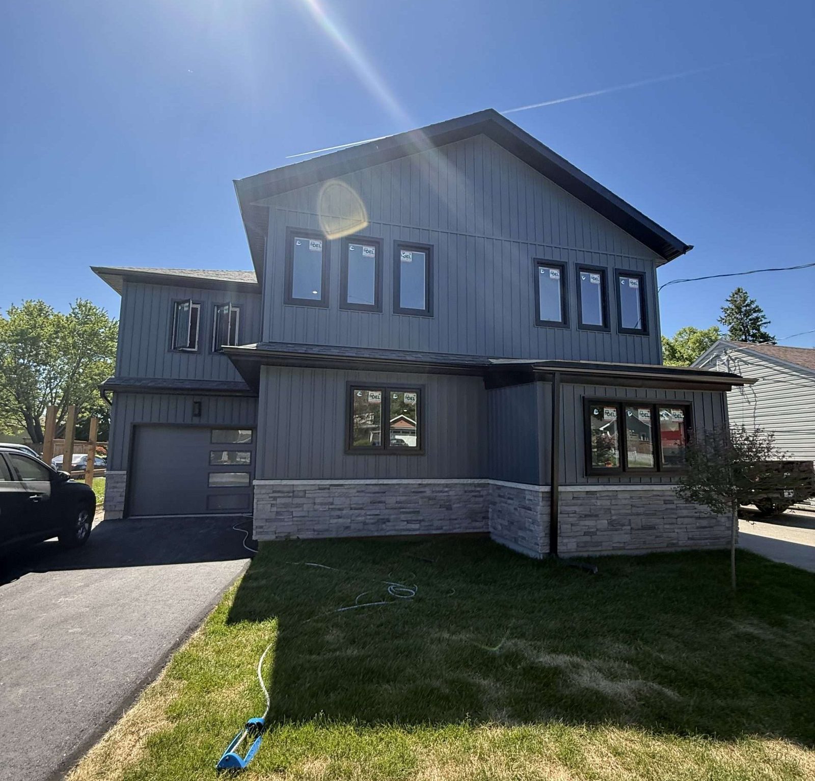 Modern grey and stone two-storey home